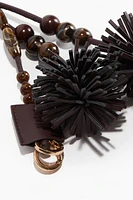 Décoration de sac à pompons