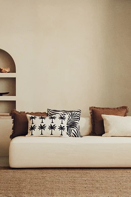 Housse de coussin brodée