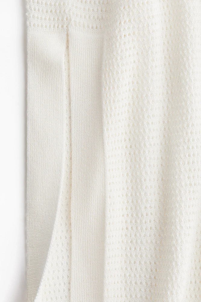 Robe de plage en tricot pointelle