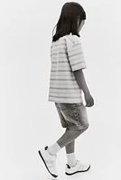 Short coupe ample en denim