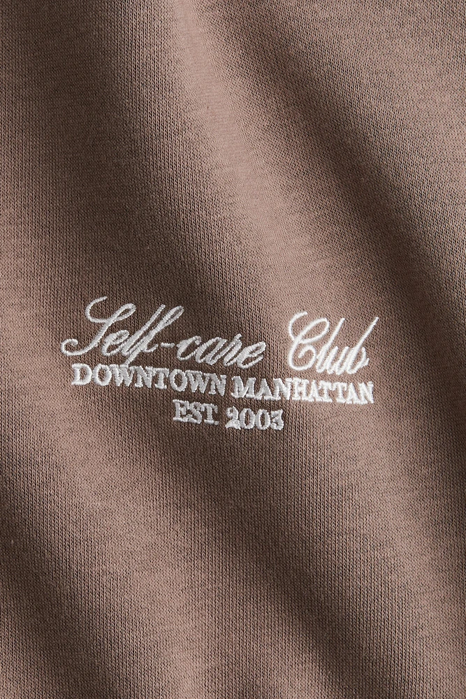 Sweatshirt with Text Motif