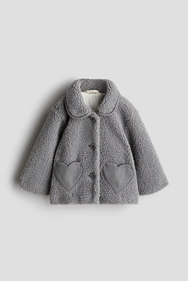 Veste en tissu peluche avec poches cœur