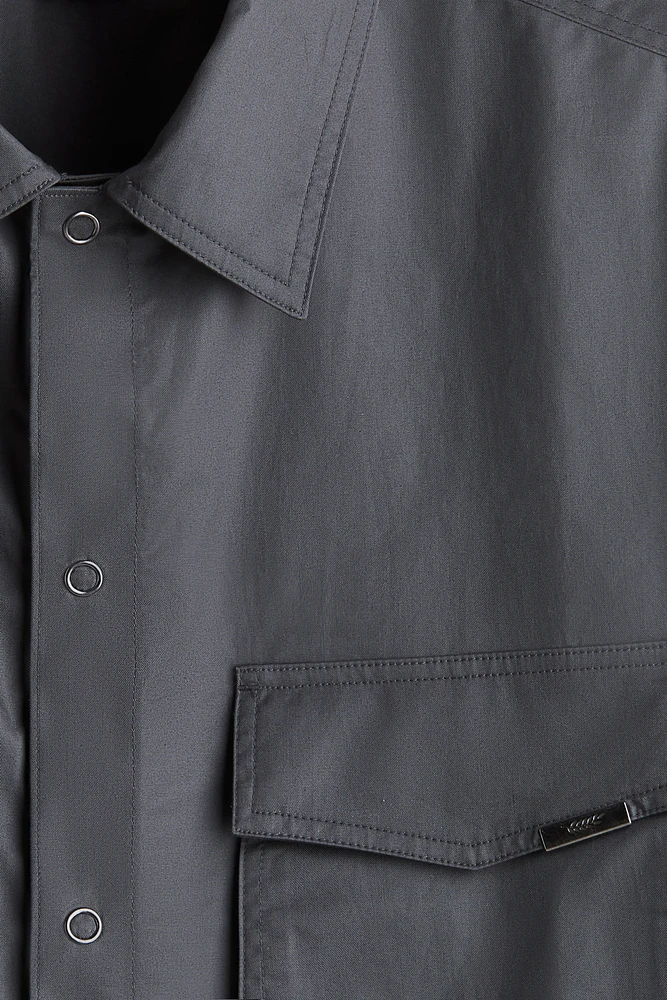 Chemise utilitaire à manches courtes coupe ample