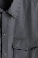 Chemise utilitaire à manches courtes coupe ample