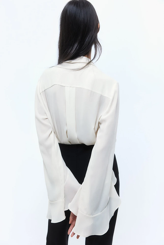 Flounce-Trimmed Tie-Neck Blouse