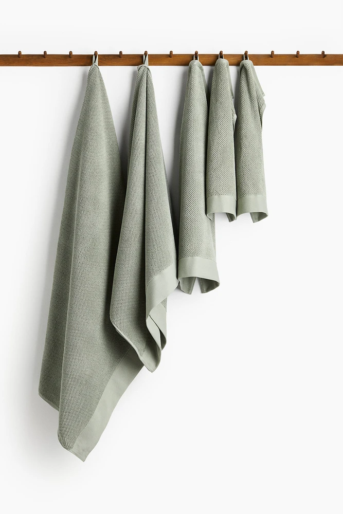 Serviette de bain en coton éponge