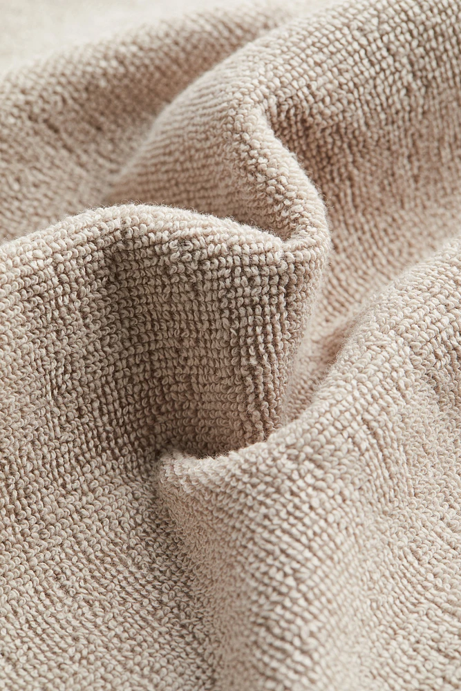 Drap de bain en éponge