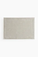 Tapis de bain en coton éponge