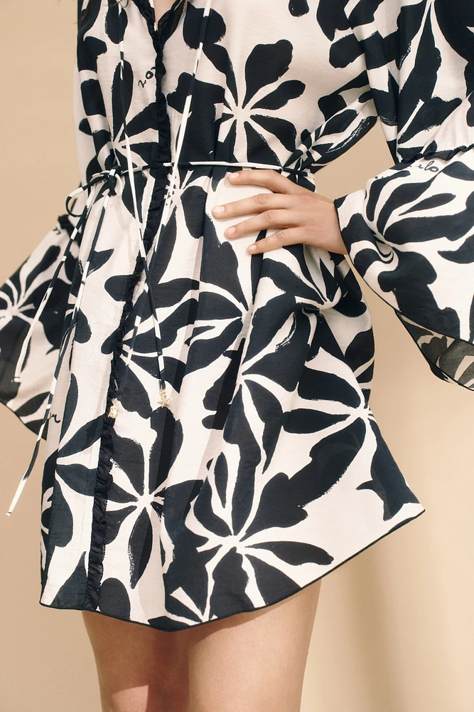 Robe tunique à manches trompette
