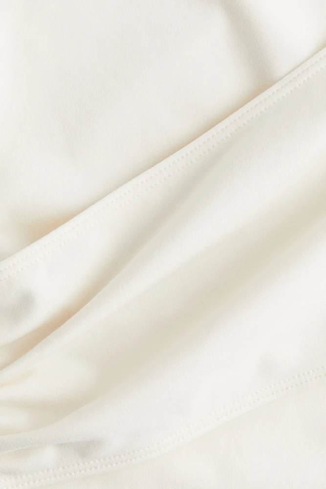 Haut de sport croisé SoftMove™