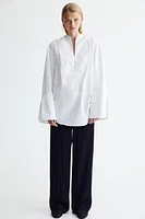 Pantalon de tailleur à revers