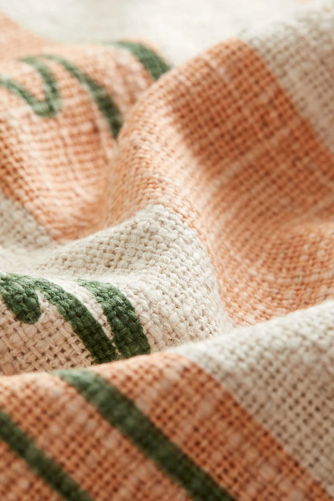 Housse de coussin frangée en lin mélangé
