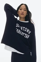 Sweatshirt with Text Motif