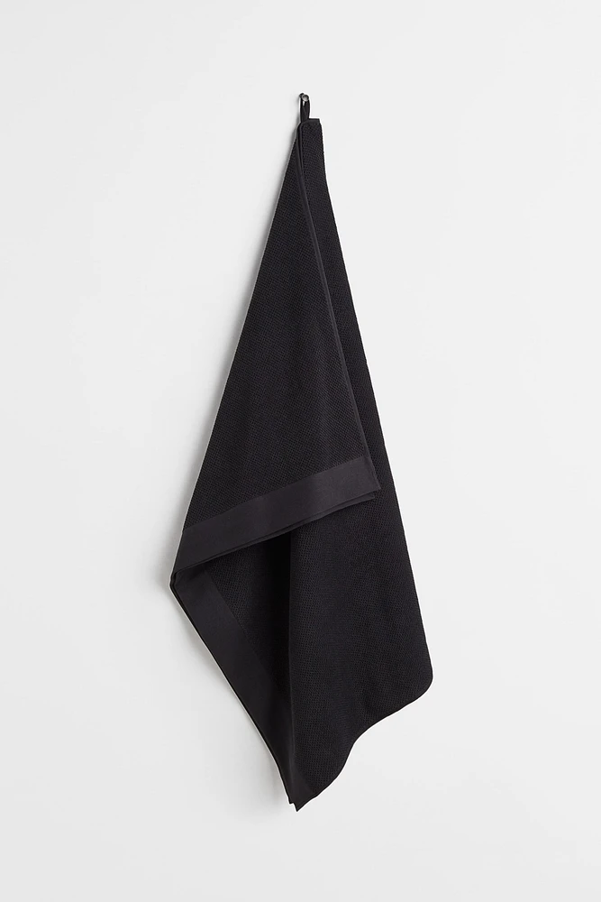 Serviette de bain en coton éponge