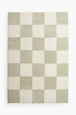 Grand tapis en laine mélangée