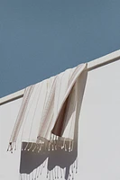 Serviette de plage en tissu jacquard