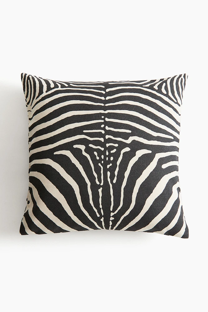 Housse de coussin avec imprimé animal
