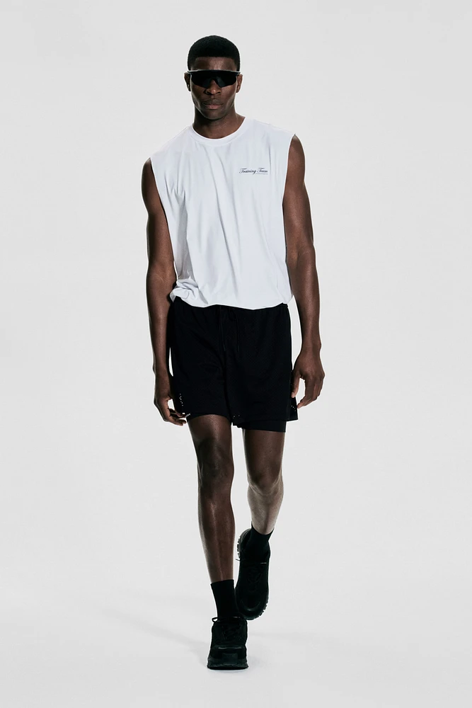 Short de sport mi-long 2-en-1 DryMove🅪
