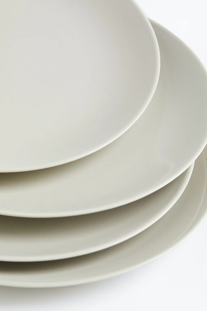 Lot de 4 assiettes en porcelaine