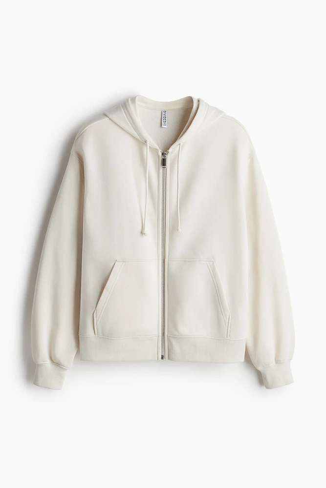 Veste à capuchon glissière