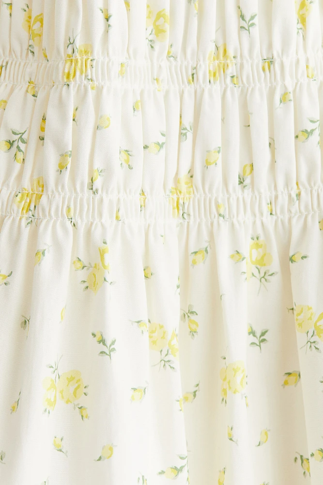 Robe en coton à corsage nid d'abeille