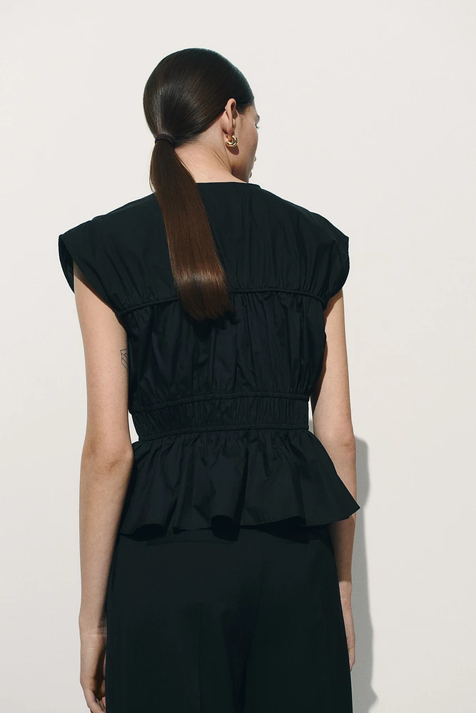 Blouse en popeline avec cordons de serrage