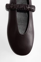 Scrunchie-detail ballet pumps