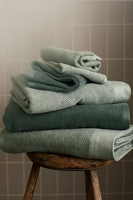Serviette de bain en coton éponge