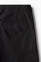 Pantalon cargo près du corps