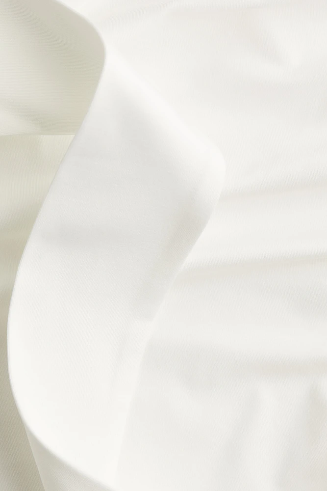Haut asymétrique à effet drapé