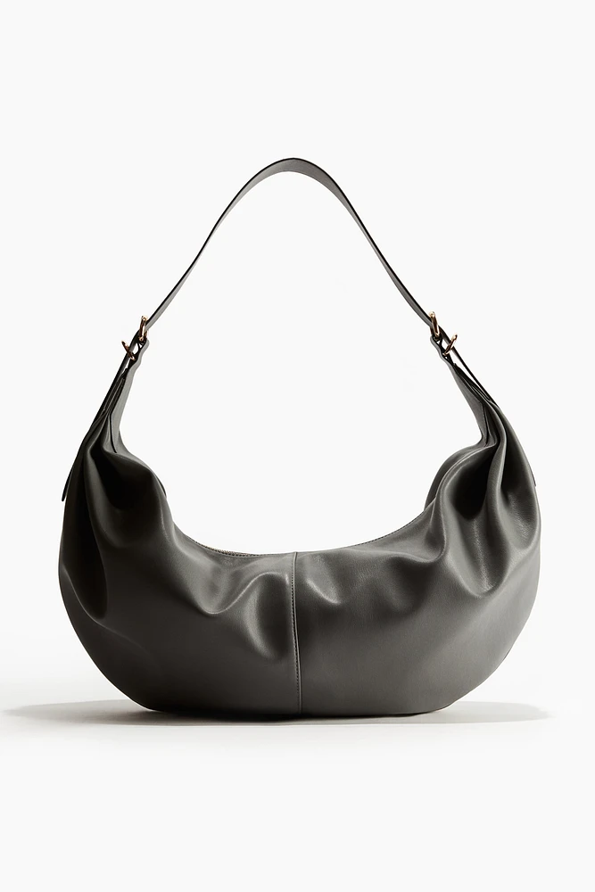 Sac à bandoulière de forme arrondie