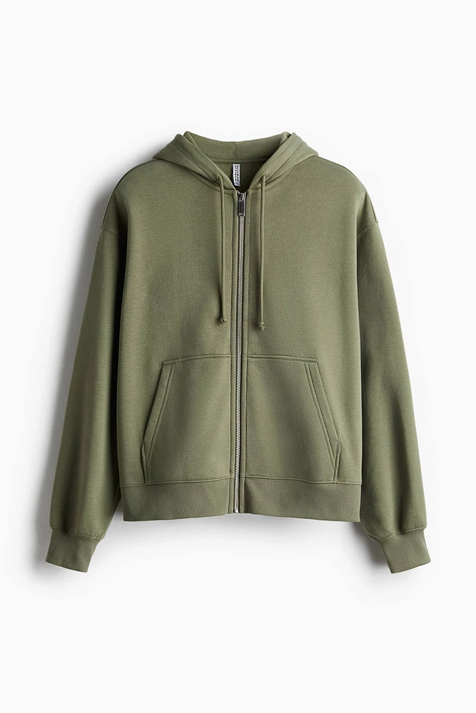 Veste à capuchon glissière