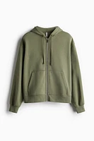 Veste à capuchon glissière