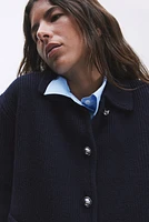 Gilet en tricot de laine côtelée