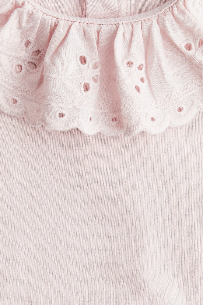 Maillot cache-couche avec col en broderie