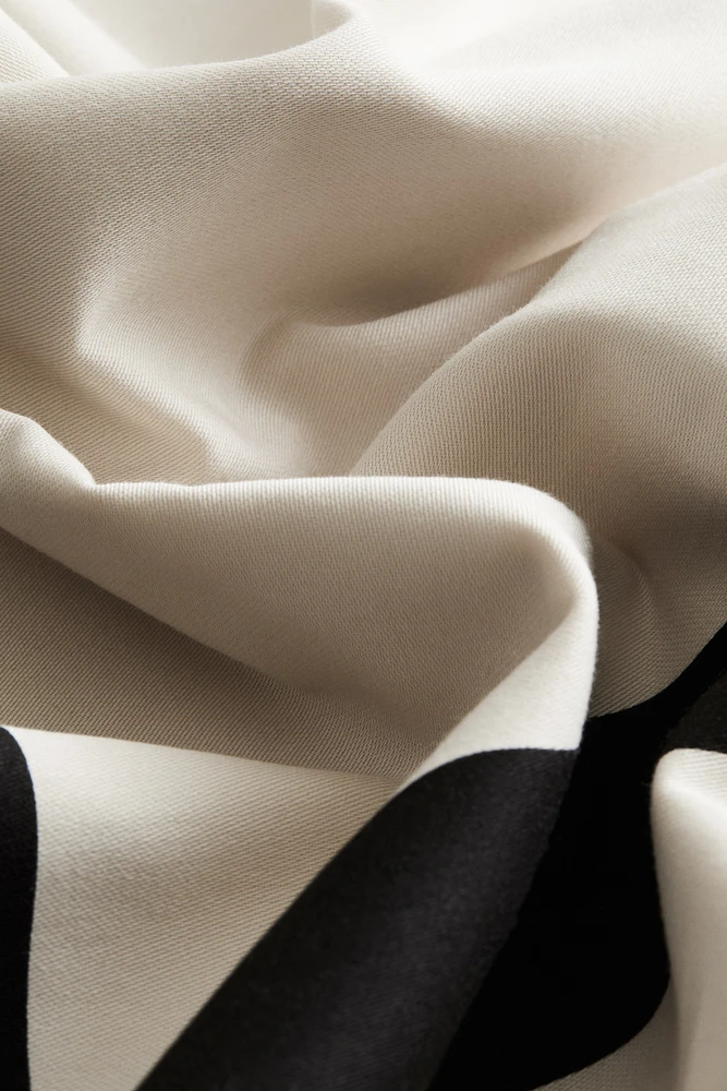 Housse de coussin en satin de coton