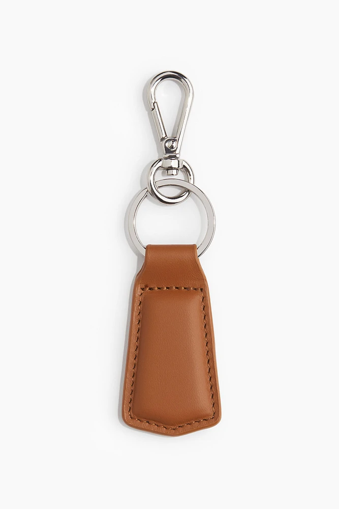Porte-clés avec lanière en cuir
