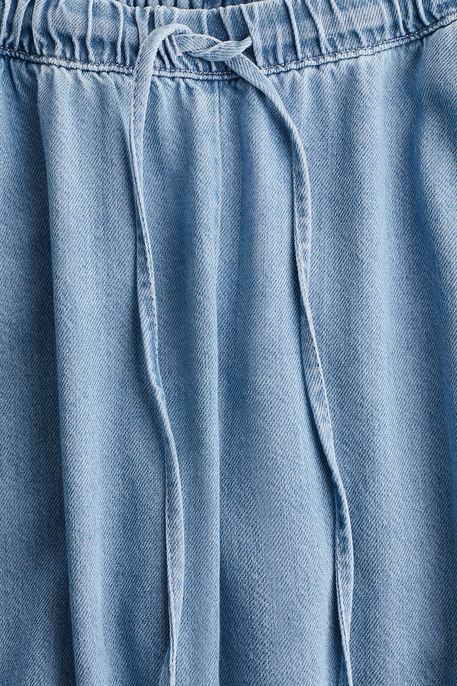 Pantalon MAMA en denim avec cordon de serrage
