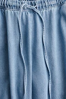 Pantalon MAMA en denim avec cordon de serrage