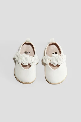 Ballerines avec appliqués