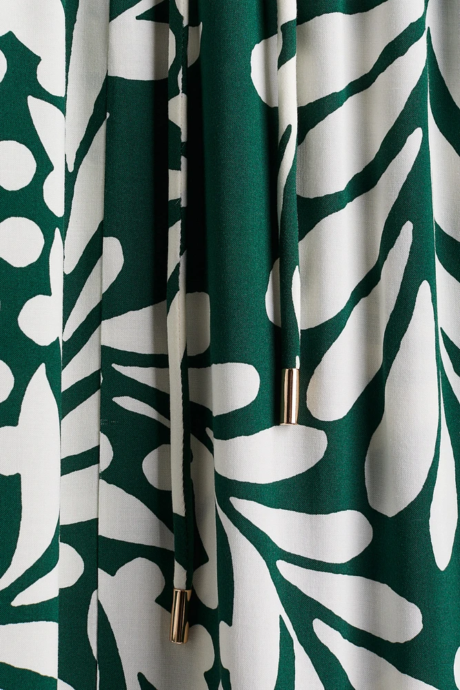 Robe longue à manches bouffantes