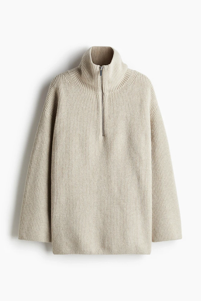 Pull zippé en tricot côtelé