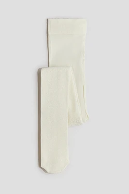 Collant en dentelle