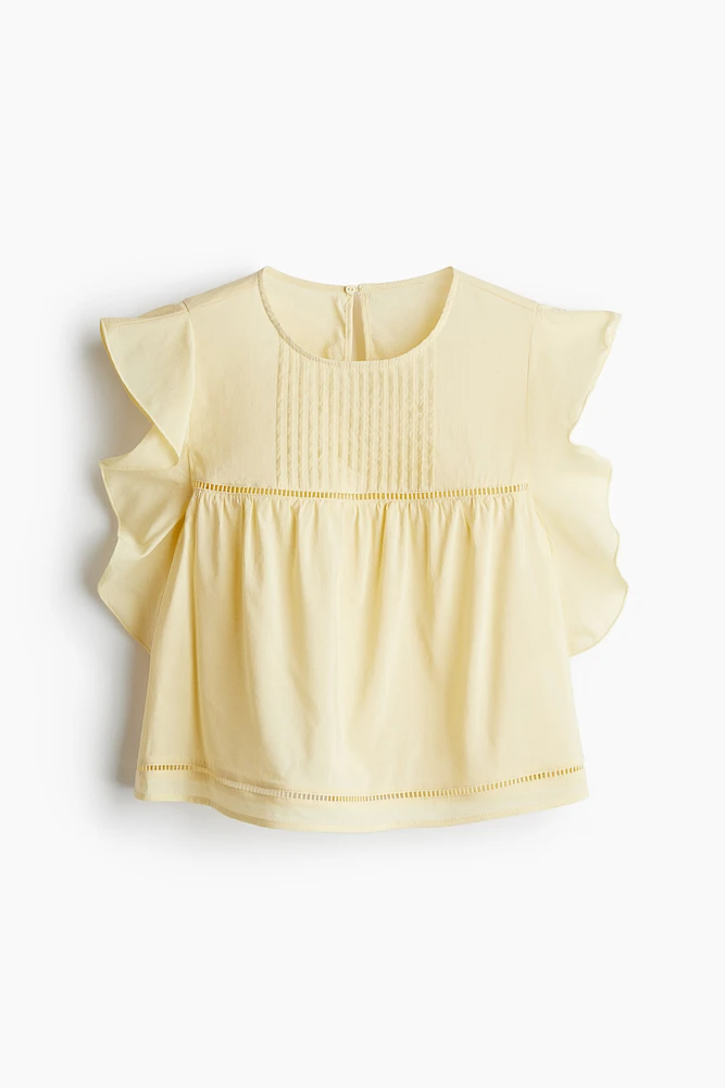 Blouse à manches volant
