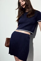 Jupe en tricot torsadé