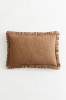 Housse de coussin en tissu flammé