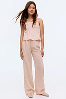 Pantalon avec détails à nouer