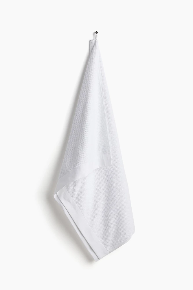 Serviette de bain en coton éponge