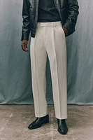 Pantalon avec plis marqués coupe décontractée