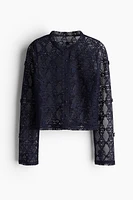 Hole-patterned cardigan